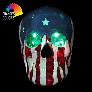 Battery-Operated Skull With USA Flag and Alternating Color LEDs, 8 Inch | Shop Garden Decor by Exhart
