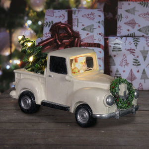 Vintage White Holiday Truck Driven by Santa with a Christmas Tree Statuary on a Battery Powered Timer, 12 x 6  Inches | Exhart