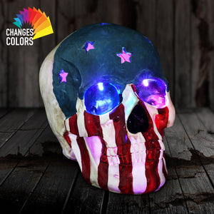Battery-Operated Skull With USA Flag and Alternating Color LEDs, 8 Inch | Shop Garden Decor by Exhart