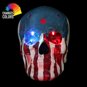 Battery-Operated Skull With USA Flag and Alternating Color LEDs, 8 Inch | Shop Garden Decor by Exhart