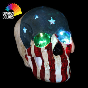 Battery-Operated Skull With USA Flag and Alternating Color LEDs, 8 Inch | Shop Garden Decor by Exhart