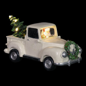 Vintage White Holiday Truck Driven by Santa with a Christmas Tree Statuary on a Battery Powered Timer, 12 x 6  Inches | Exhart